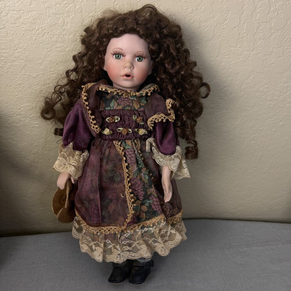 Seymour Mann Connoisseur Collection Porcelain Doll Purple Dress Curly Hair